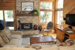 Mammoth Condo Rental Wildflower 48- Dining room, Living Room from Kitchen, beautiful stone fireplace